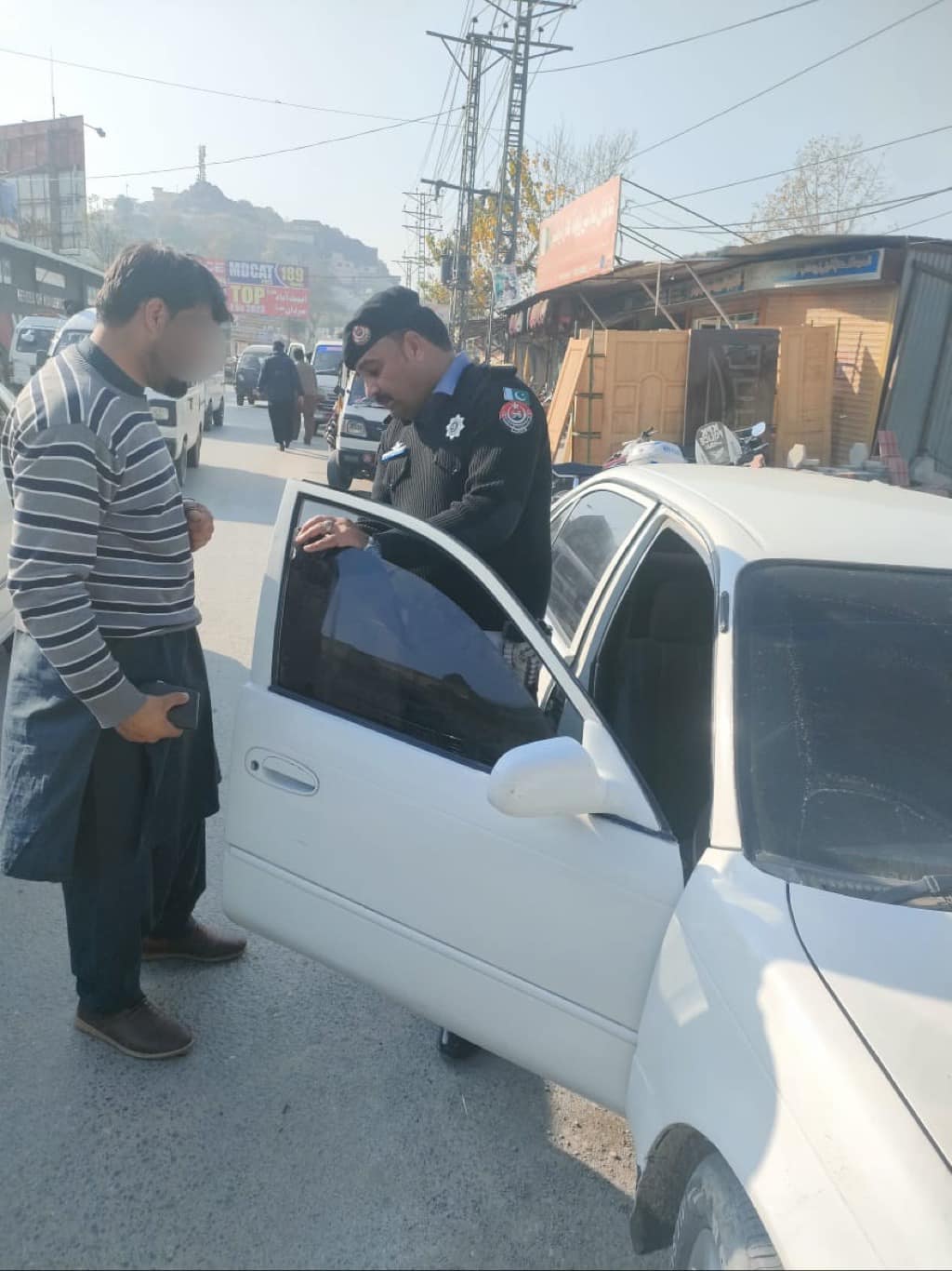 Traffic police Mansehra operations against overloading, young drivers and vehicles with black glasses.